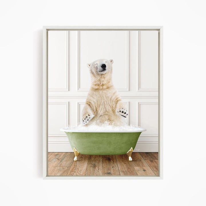 A polar bear standing in a green bathtub filled with water, with its paws raised in the air.