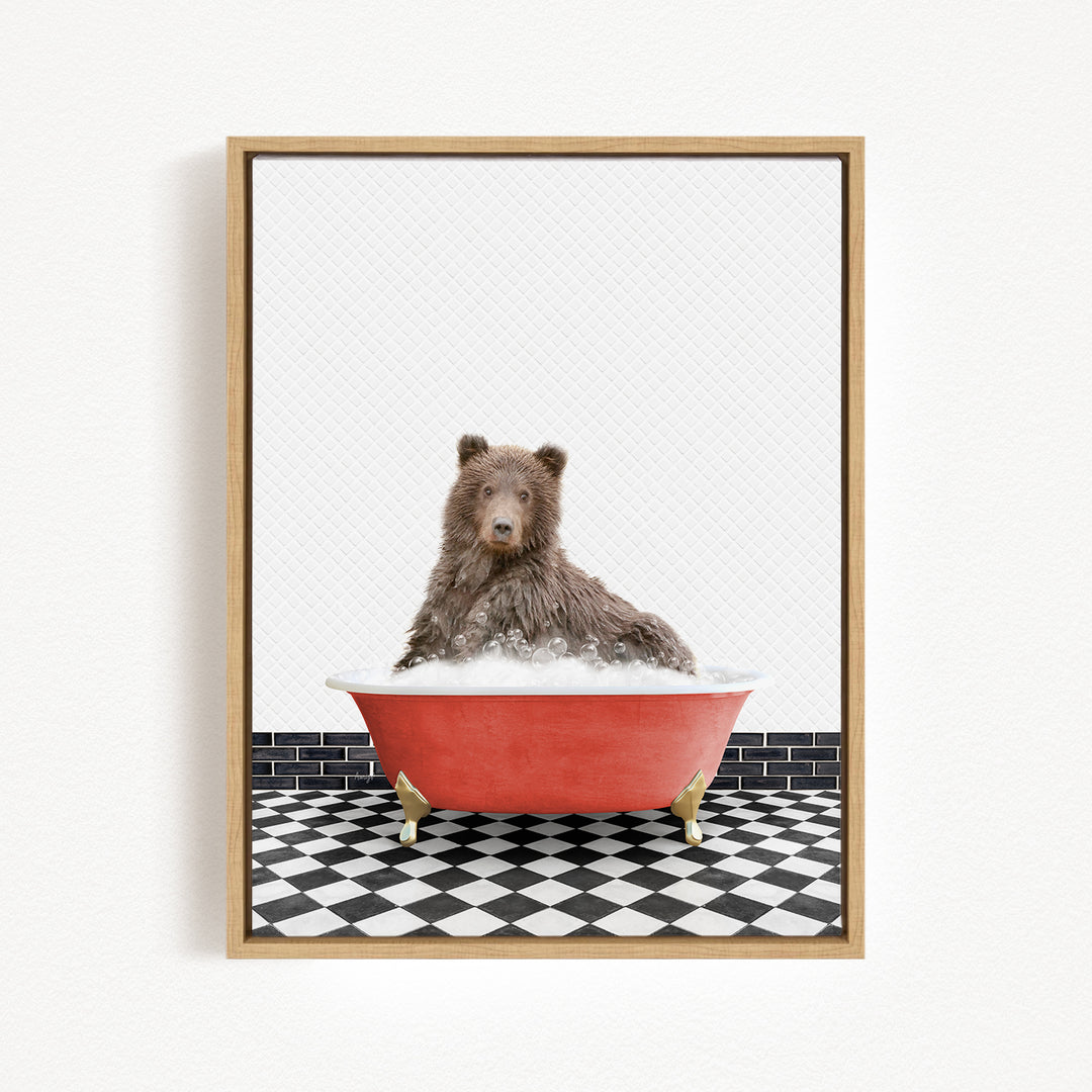 A brown bear sitting in a red bathtub filled with water, surrounded by a black and white checkered floor.