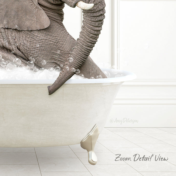 A large elephant is sitting in a bathtub filled with bubbles, creating a whimsical and playful scene.