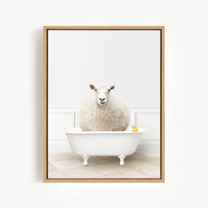 A fluffy white sheep sits in a white bathtub, with a yellow rubber duck floating on the water.