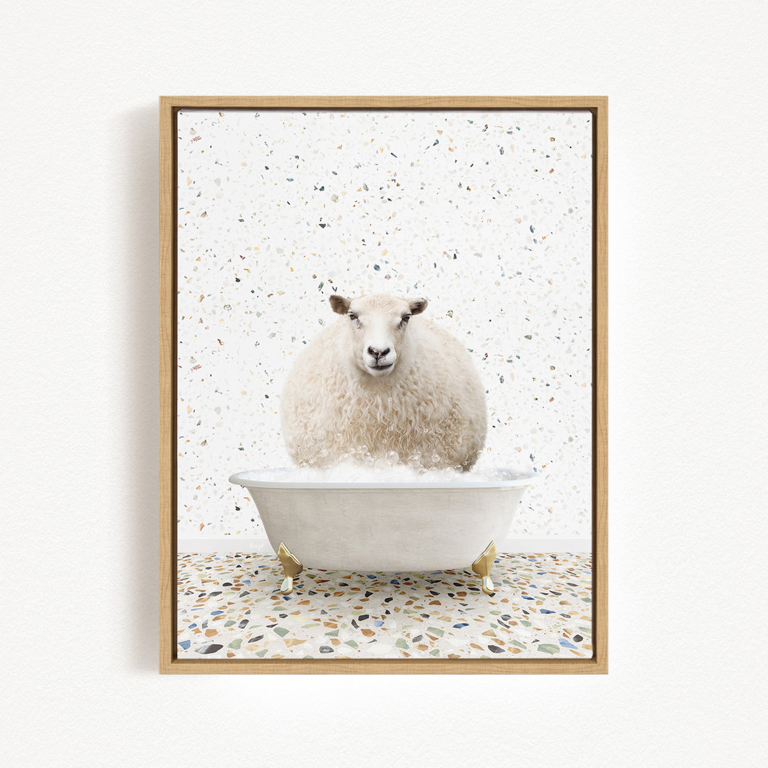 A fluffy white sheep is sitting in a white bathtub filled with bubbles, creating a whimsical and playful scene.