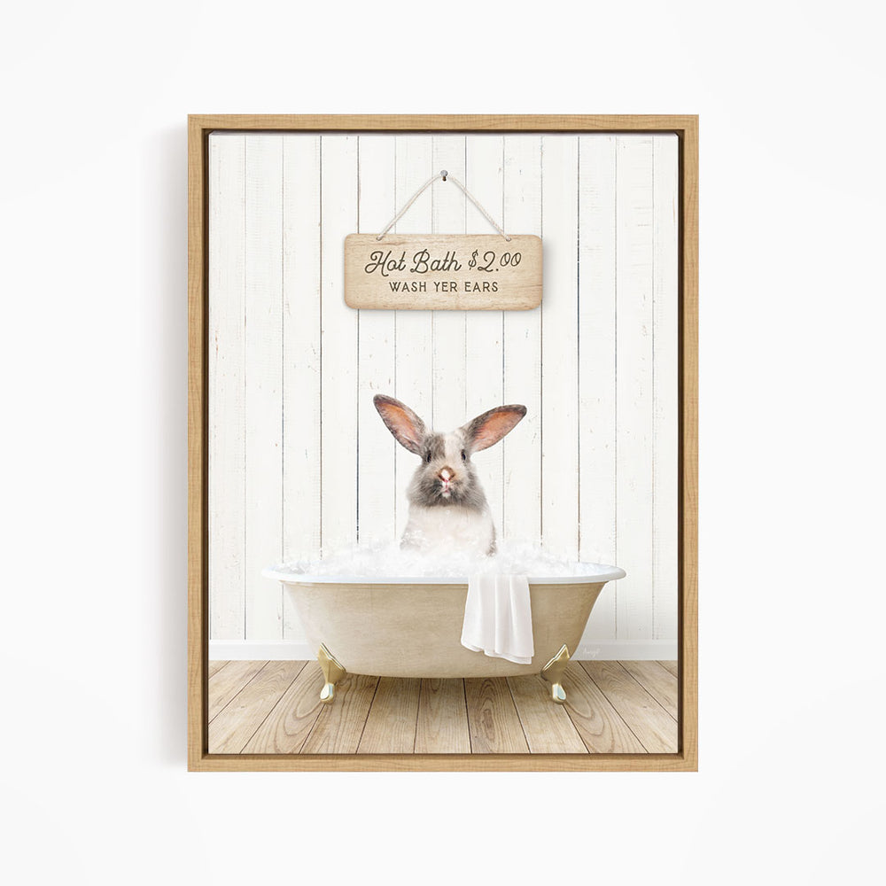 A wooden sign with the text "Hot Bath $2.00 WASH YOUR EARS" hangs above a white bathtub with a rabbit sitting inside.