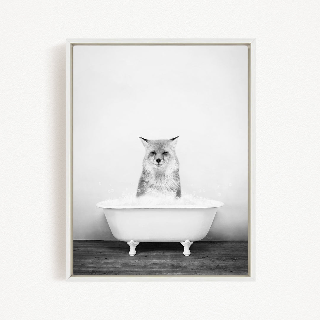 A cat sitting in a bathtub filled with water, looking directly at the camera.