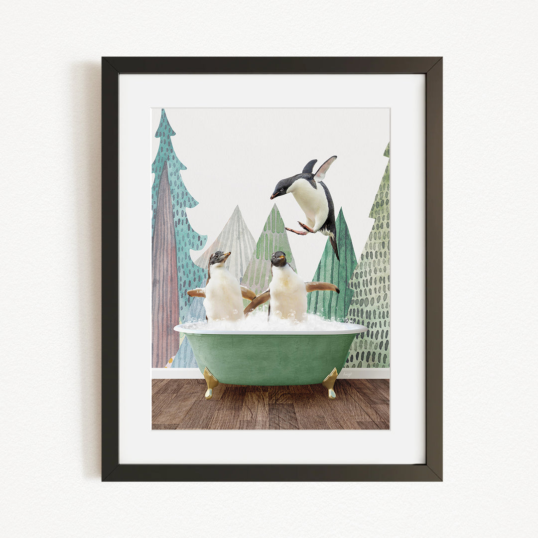 A framed image depicting two penguins sitting in a green bathtub, with one penguin flying towards the other in mid-air.