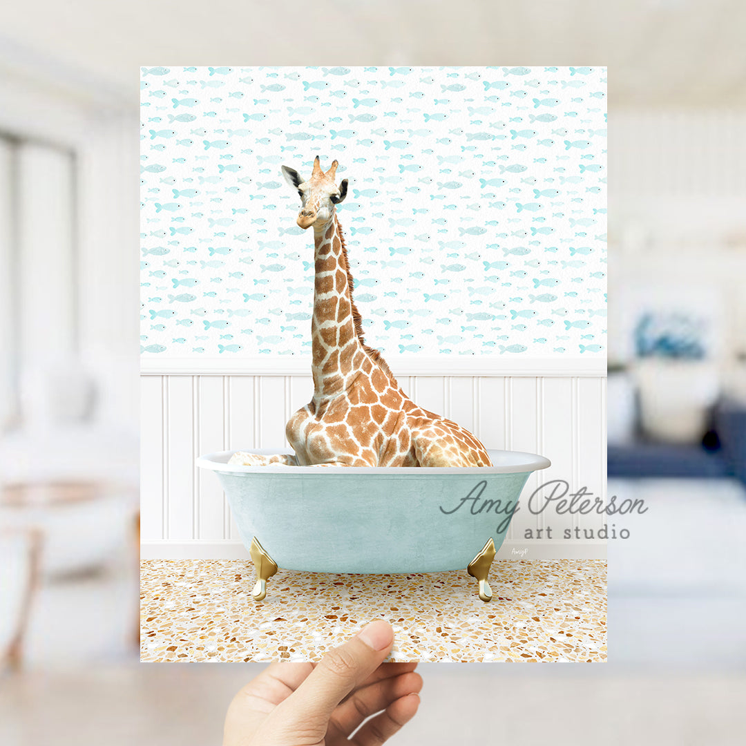 a giraffe is sitting in a bath tub