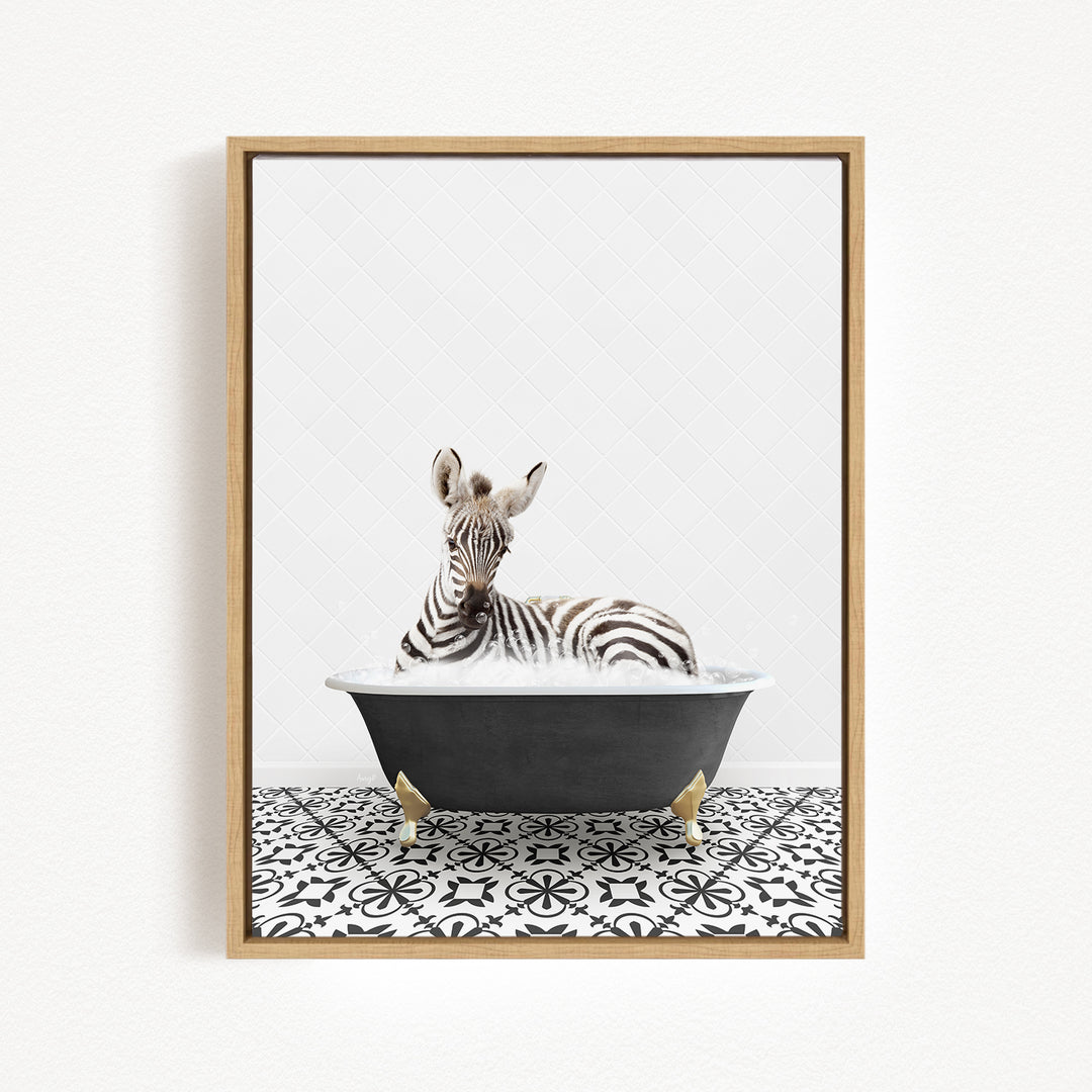 A zebra is sitting in a black bathtub with a black and white patterned floor, creating a whimsical and playful scene.