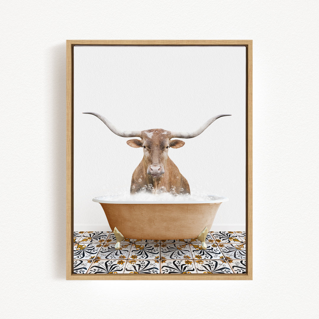 A brown bull with long horns is standing in a bathtub filled with bubbles, creating a playful and whimsical scene.