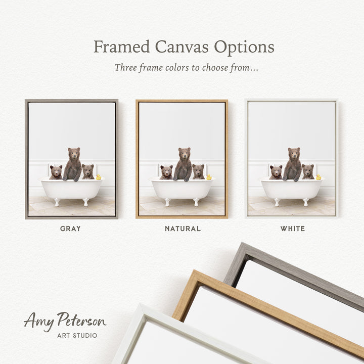 three framed canvas options, each featuring a bear sitting in a bathtub. The options include a gray frame, a natural frame, and a white frame. The bears are depicted in different colors, with one bear in each frame.