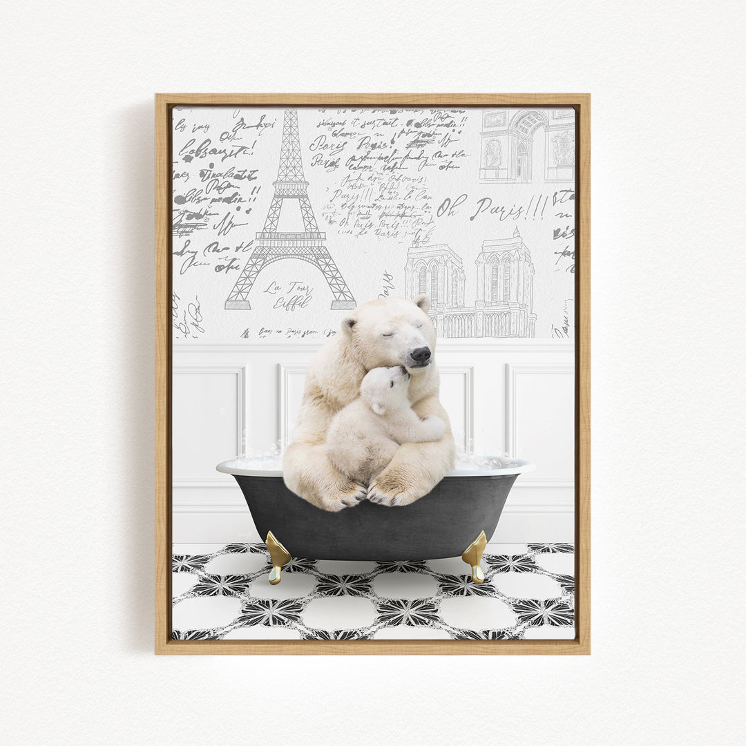 A polar bear is sitting in a bathtub, with another polar bear resting on its lap, in a room with a Paris-themed wallpaper.