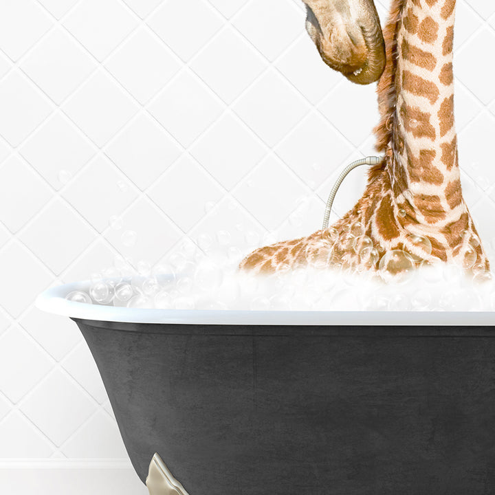 a baby giraffe in a bath tub with foam