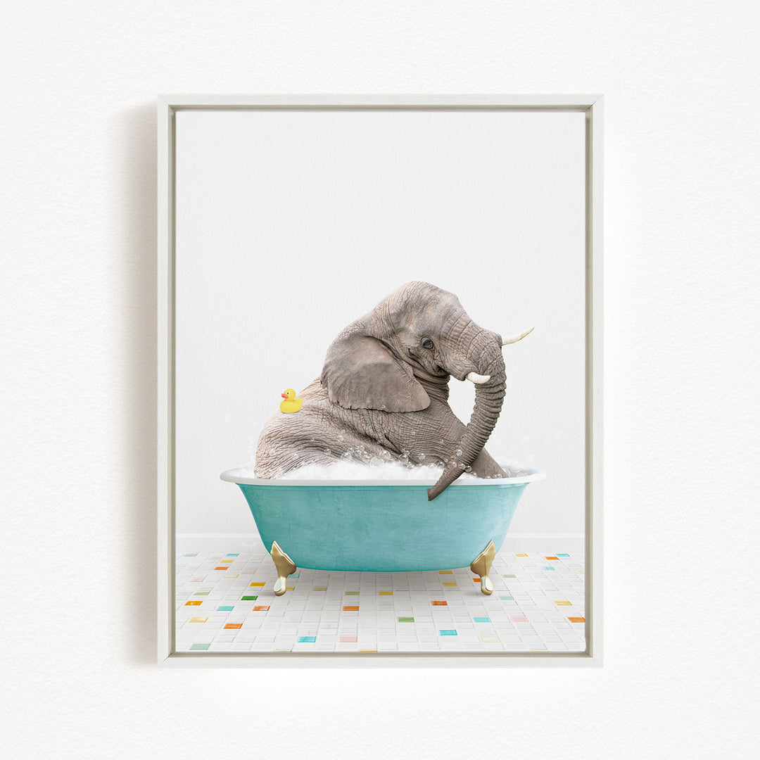A gray elephant is sitting in a blue bathtub, with a yellow duck perched on its head.
