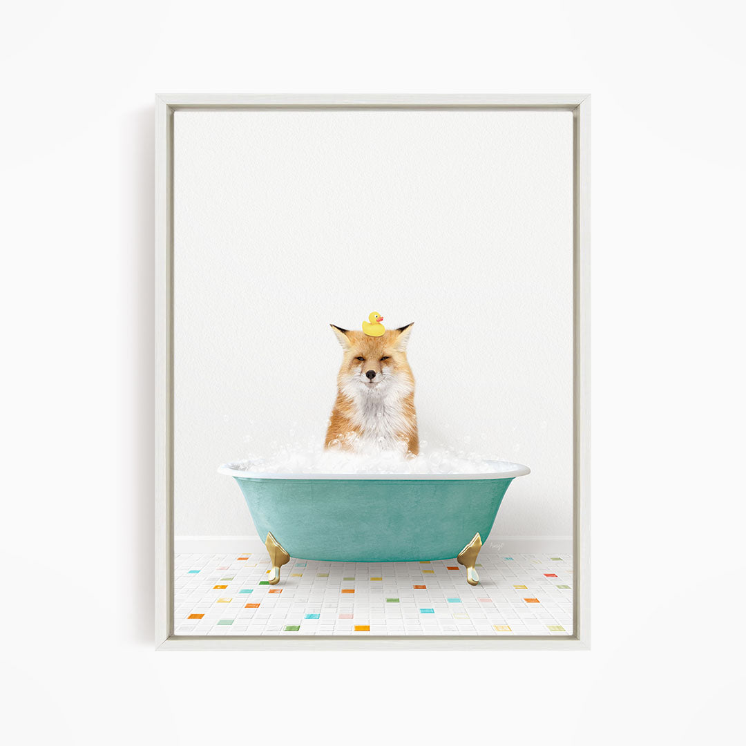 A fox is sitting in a green bathtub filled with bubbles, with a group of yellow rubber ducks floating on the water.