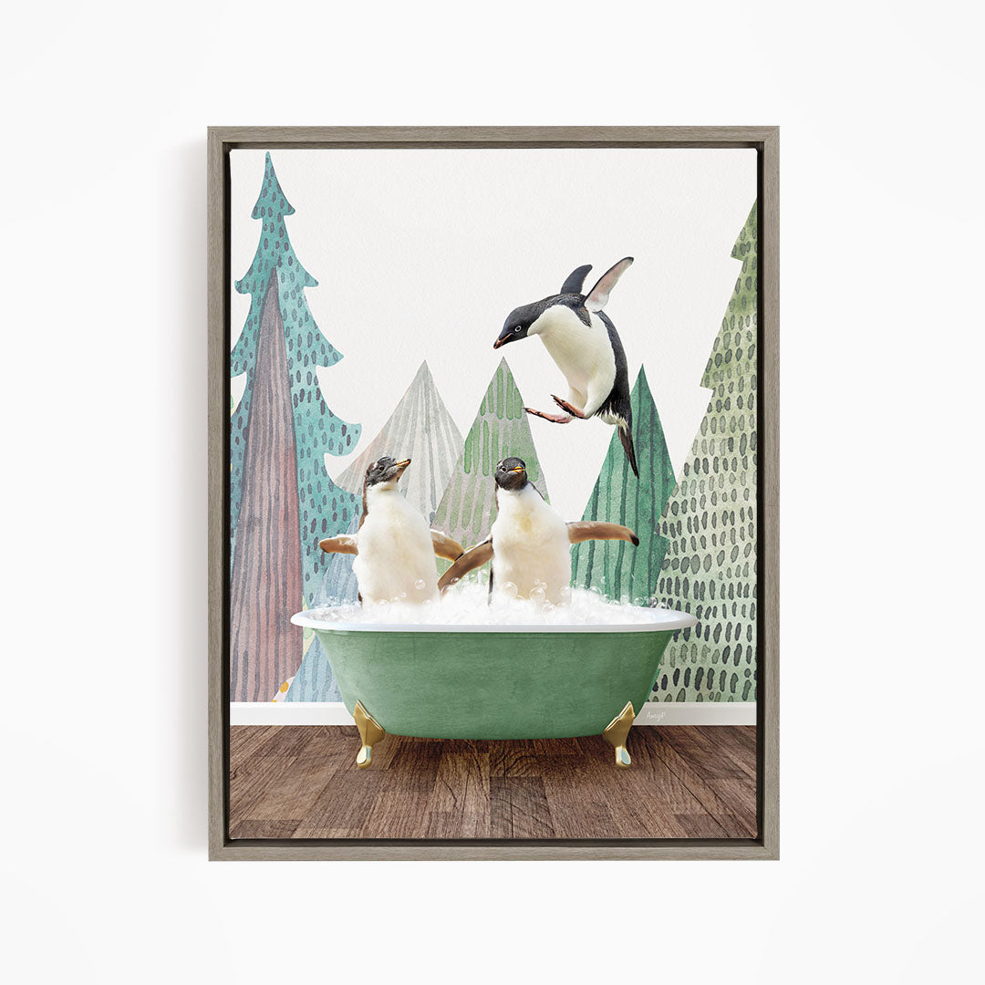 A framed image depicting two penguins sitting in a green bathtub, with one penguin flying towards the other in mid-air.
