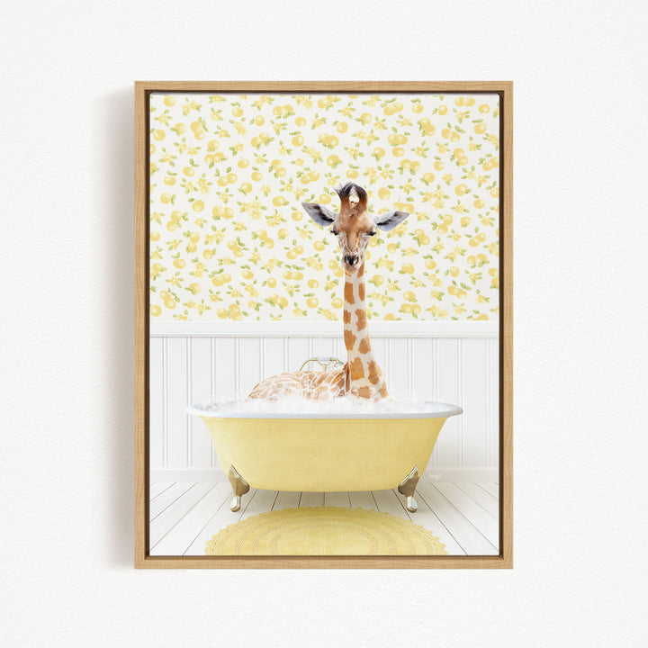 A giraffe is sitting in a yellow bathtub filled with water, surrounded by a yellow and white floral pattern on the wall behind it.