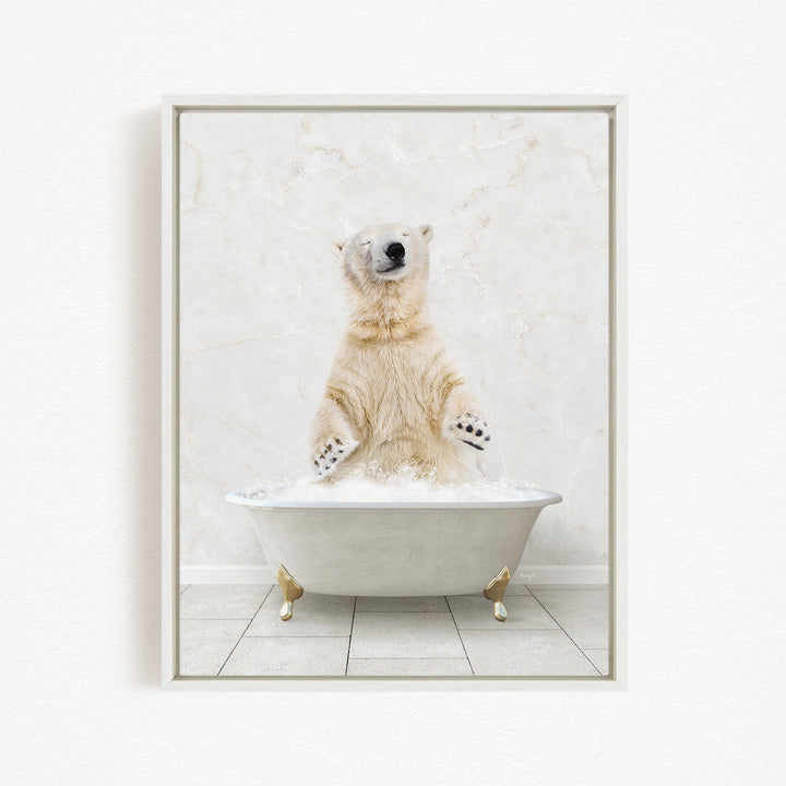 A polar bear standing in a white bathtub filled with water, appearing to be enjoying a bath.