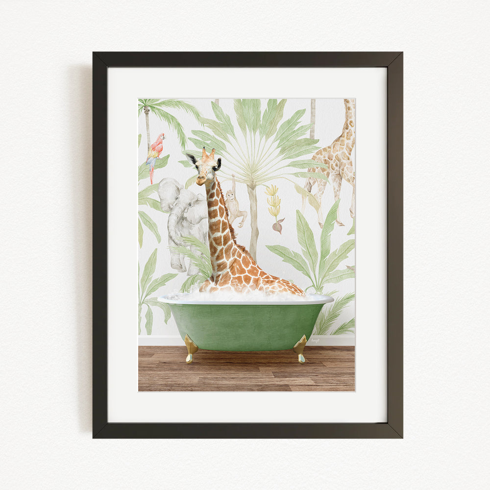 A giraffe sitting in a green bathtub, surrounded by tropical foliage, is the central focus of the framed artwork.
