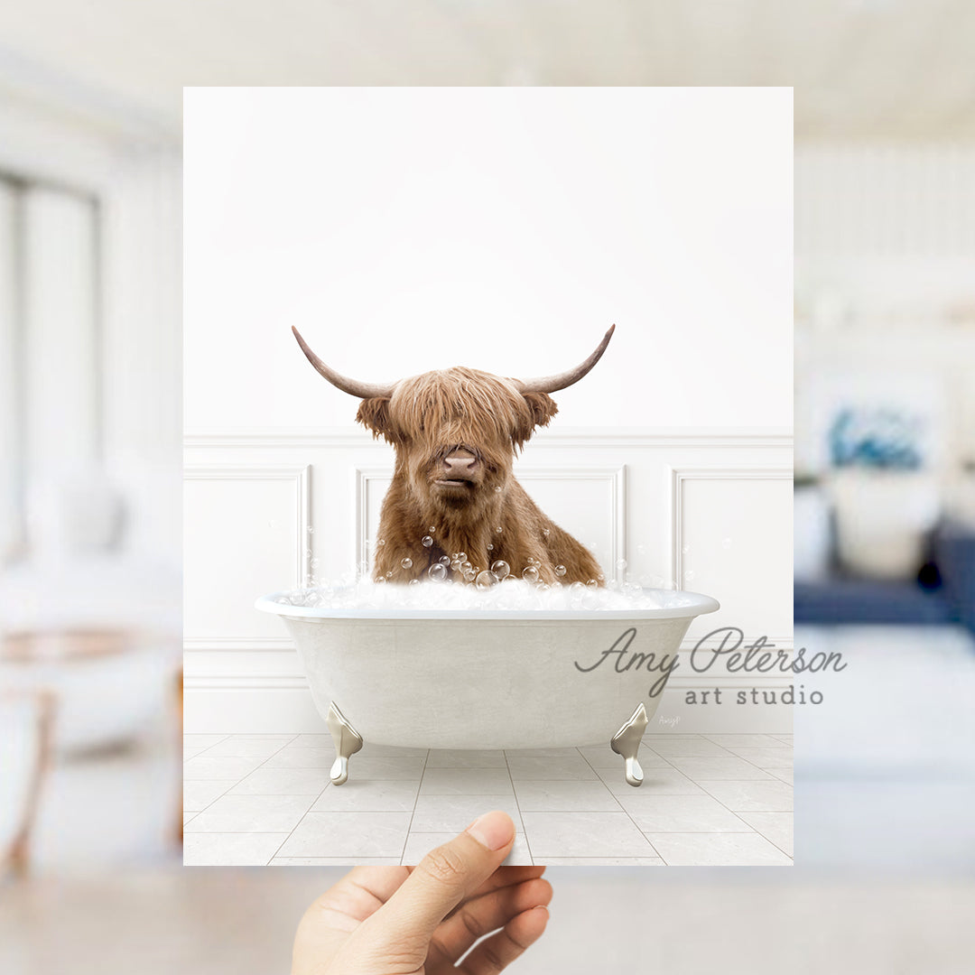 a hand holding a card with a picture of a dog in a bathtub