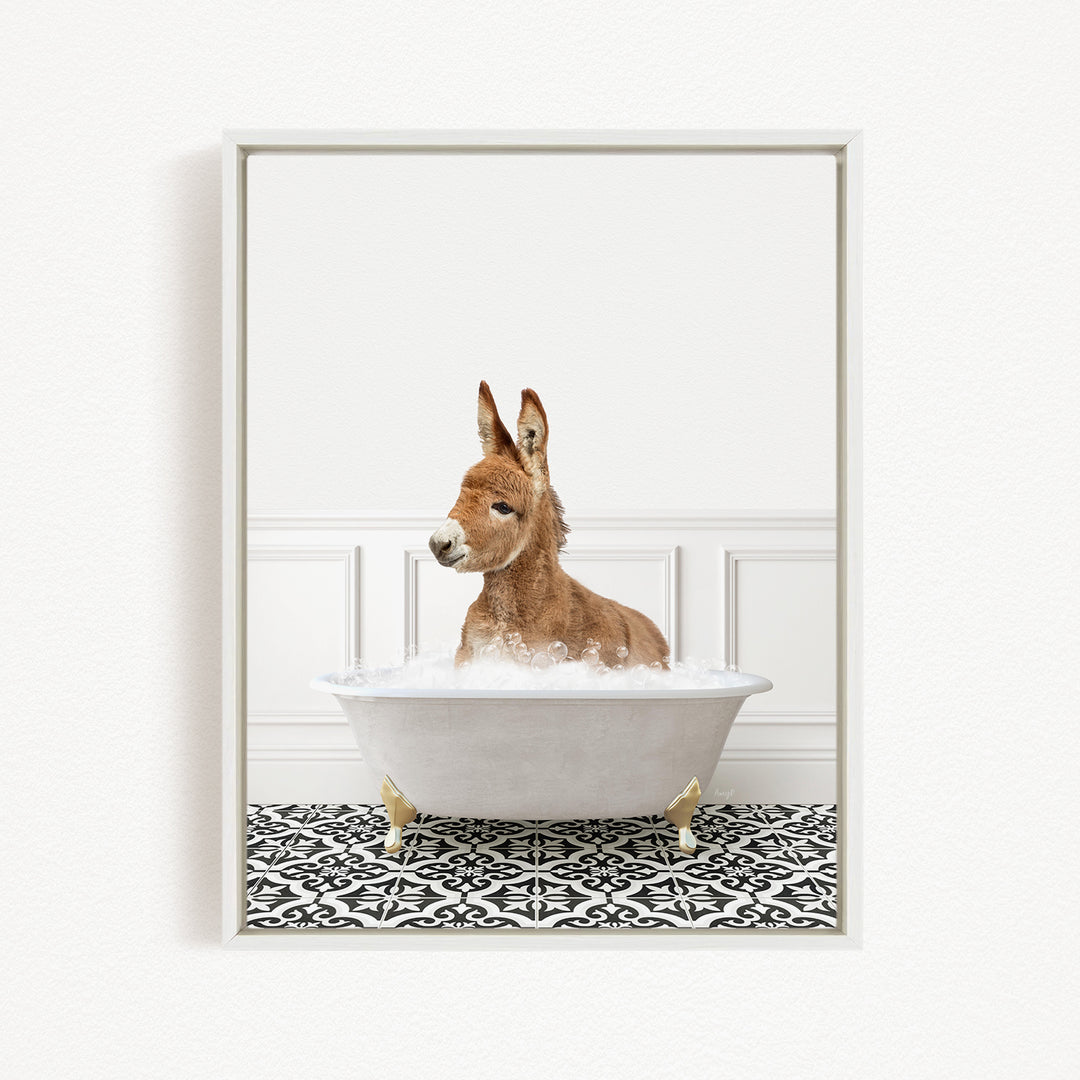 A donkey is sitting in a white bathtub filled with water, creating a playful and whimsical scene.