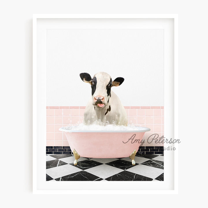 a cow sitting in a bathtub with its tongue out