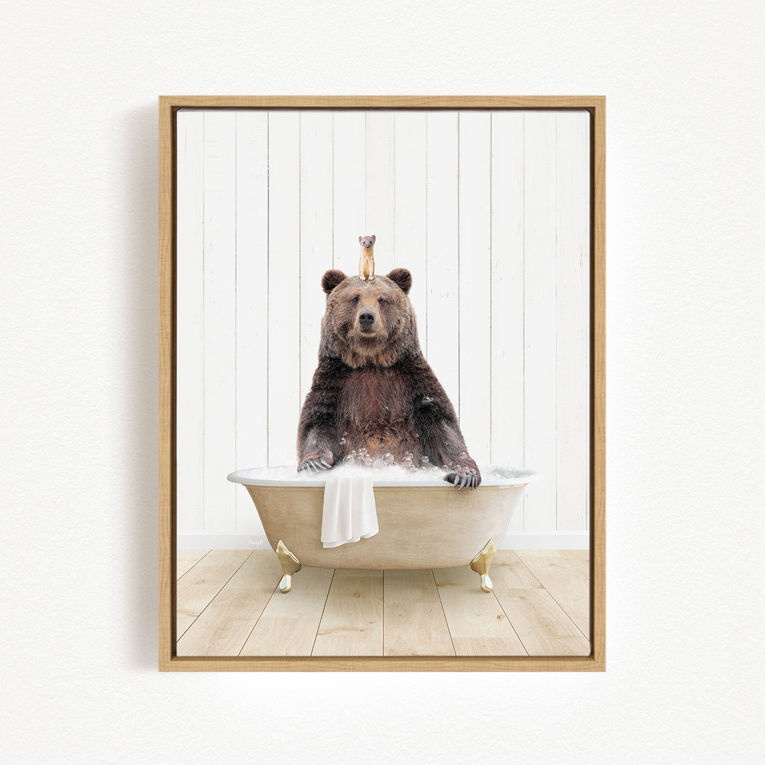 A brown bear sitting in a bathtub, with a small animal perched on its head.