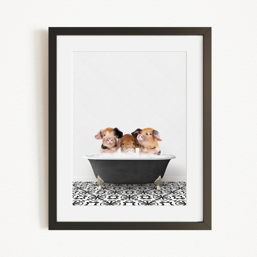 Three adorable pigs sitting in a bathtub, enjoying a relaxing bath together.