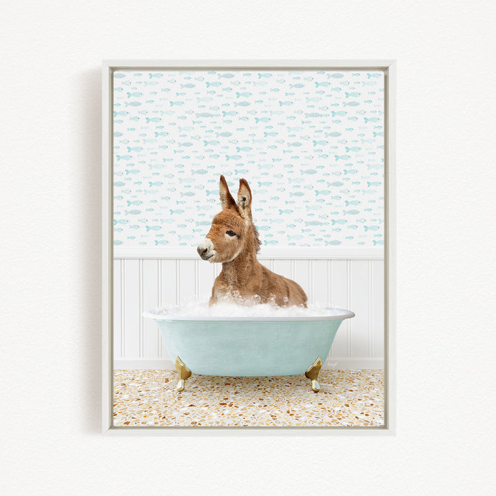 A donkey is sitting in a bathtub filled with water, surrounded by a pattern of fish.