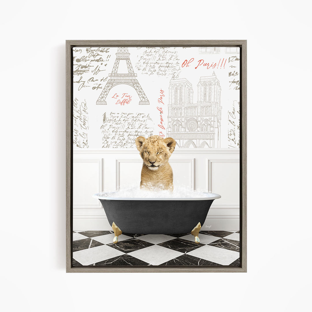 A young lion cub sitting in a bathtub filled with water, surrounded by a Paris-themed background with the Eiffel Tower and other landmarks.