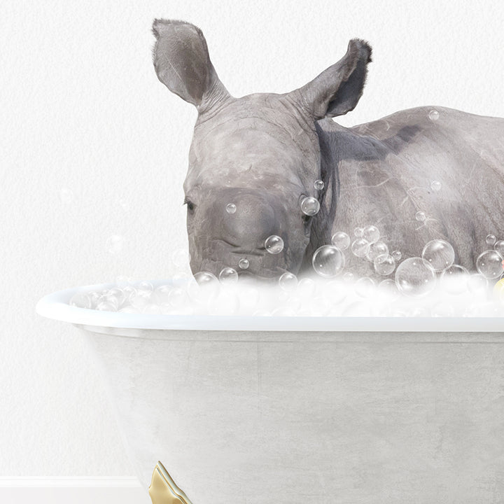 a rhino in a bathtub with bubbles of soap