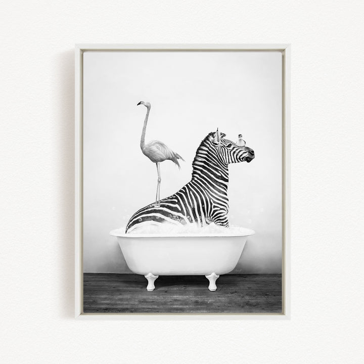 A zebra is sitting in a bathtub, with a flamingo standing on its back.