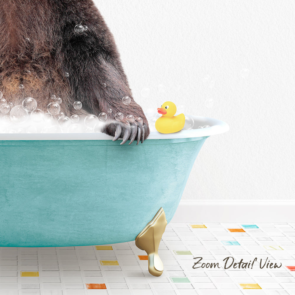 A bathtub filled with bubbles, with a rubber duck sitting on the edge and a gold claw resting on the side.
