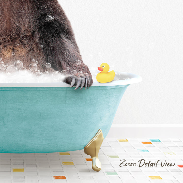 A bathtub filled with bubbles, with a rubber duck sitting on the edge and a gold claw resting on the side.