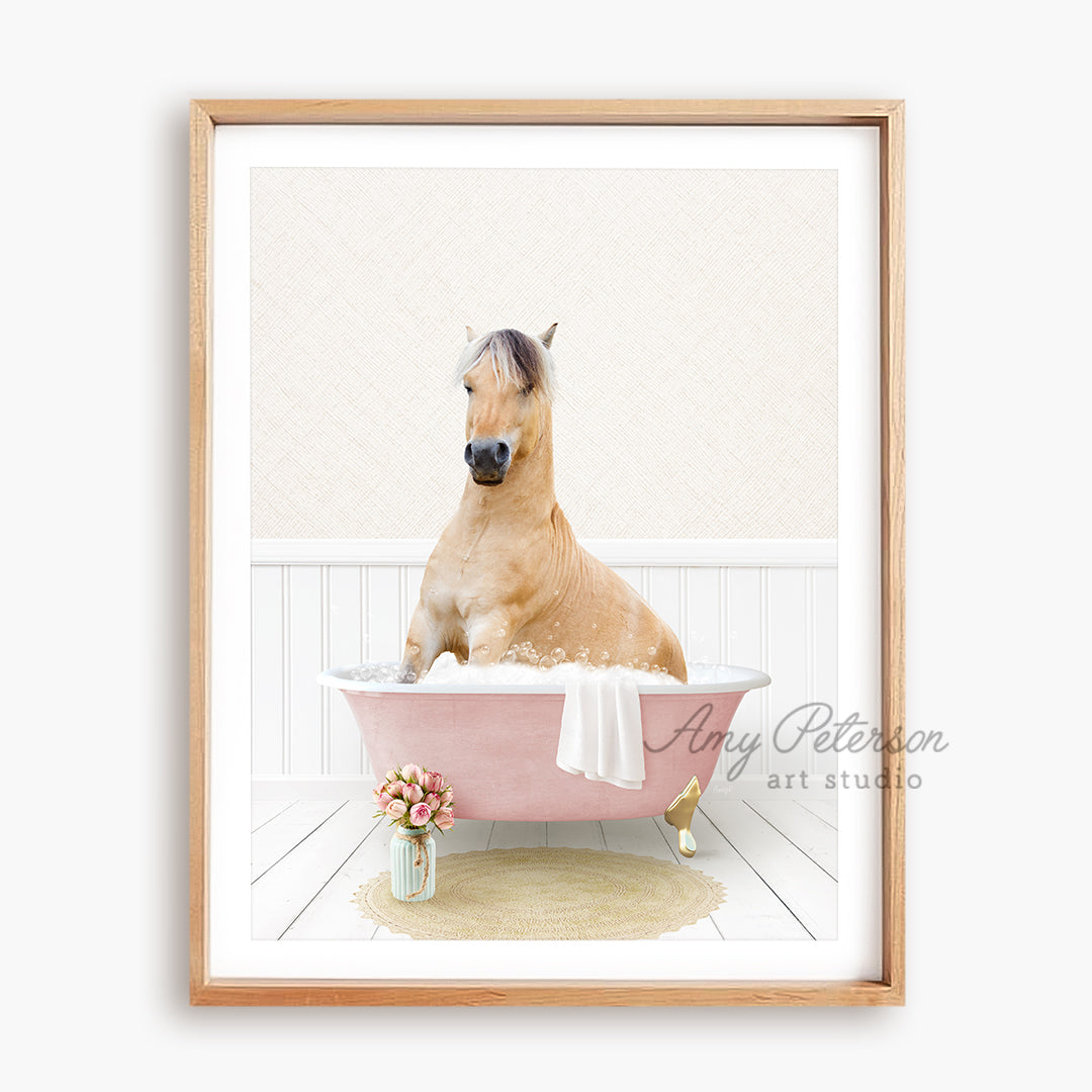 a horse sitting in a pink bath tub