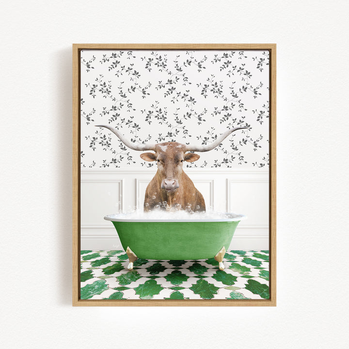 A brown cow with large horns is sitting in a green bathtub filled with water, surrounded by a patterned wall and green and white tiles on the floor.
