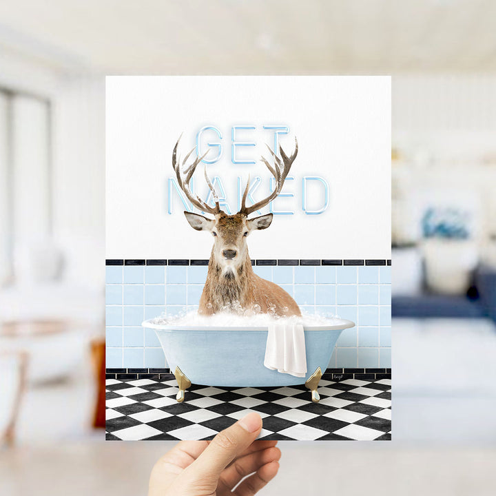 A deer with antlers is sitting in a bathtub filled with bubbles, with the words "GET NAUGED" written on the wall behind it.