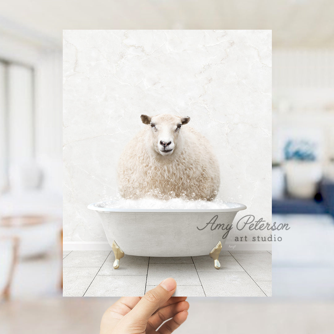 a hand holding a photo of a sheep in a bathtub