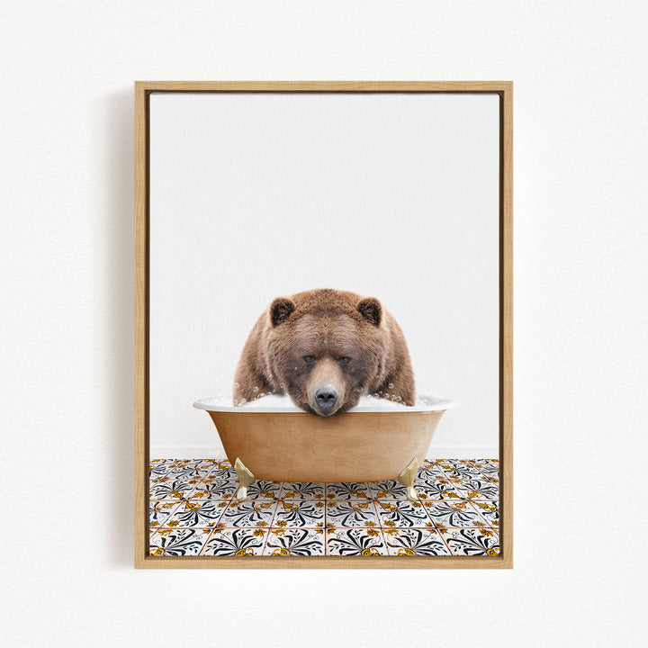 A brown bear is sitting in a bathtub filled with water, appearing to be enjoying the bath.