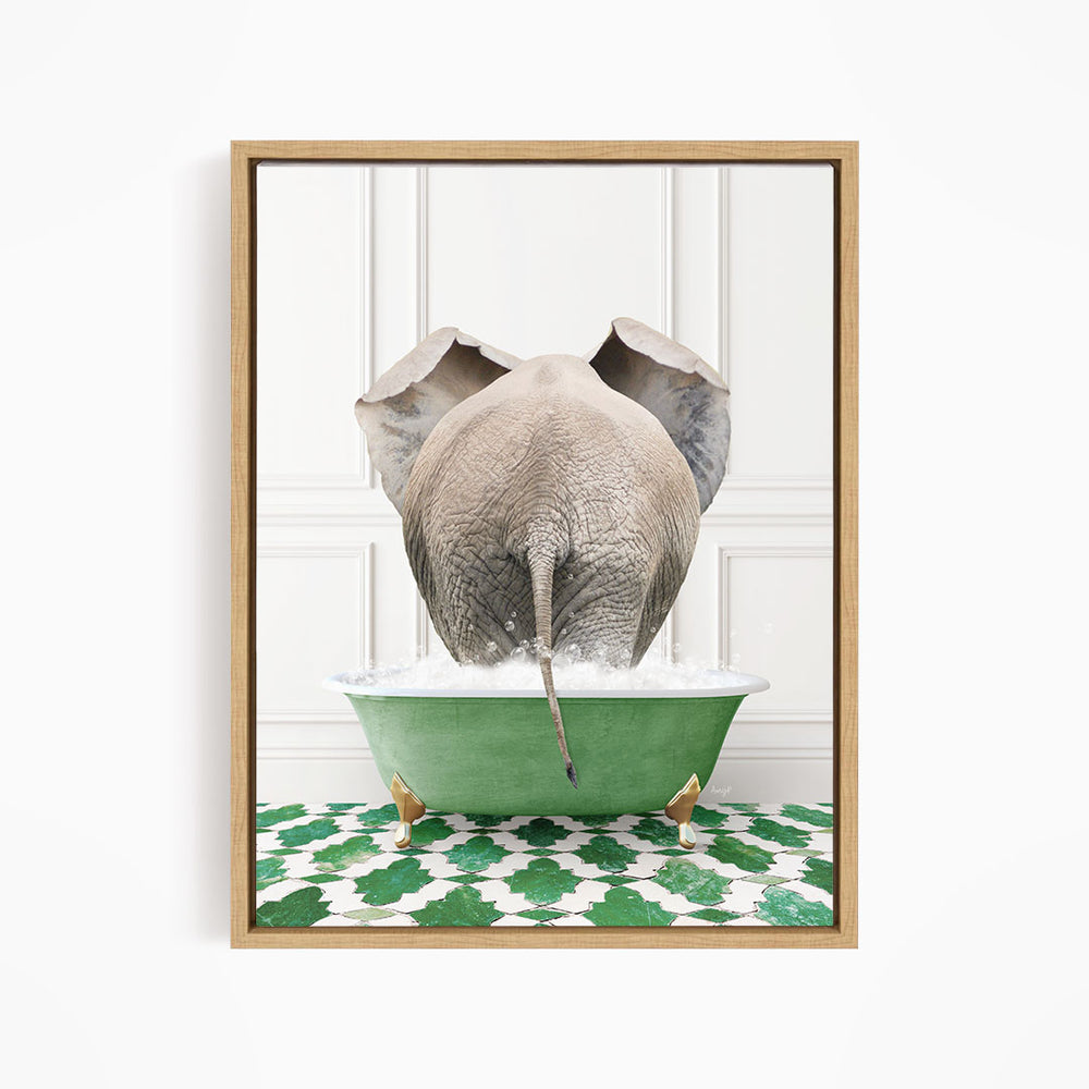 A gray elephant is standing in a green bathtub filled with water, with its trunk submerged in the water.