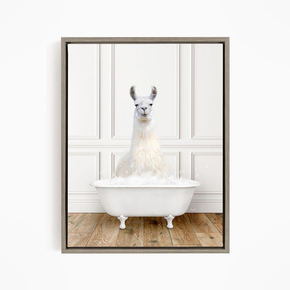 A white llama sitting in a white bathtub filled with bubbles, creating a whimsical and playful scene.
