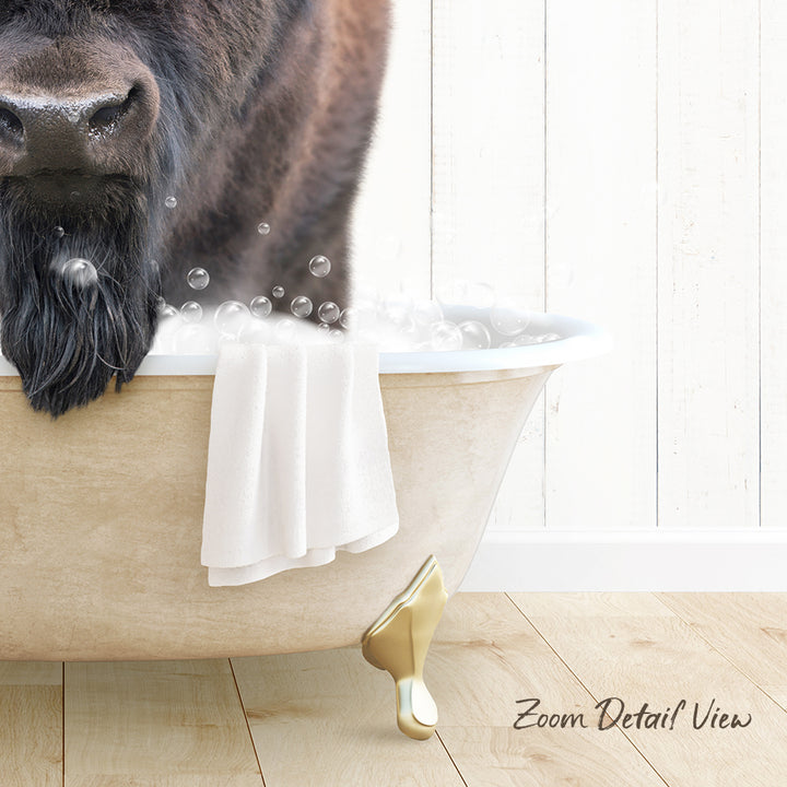 A dog is sitting in a bathtub filled with bubbles, with a towel draped over the side of the tub.