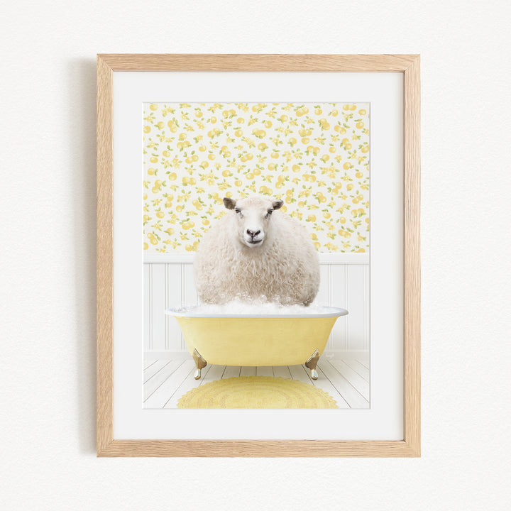A fluffy white sheep sits in a yellow bathtub, surrounded by a yellow floral patterned wall.