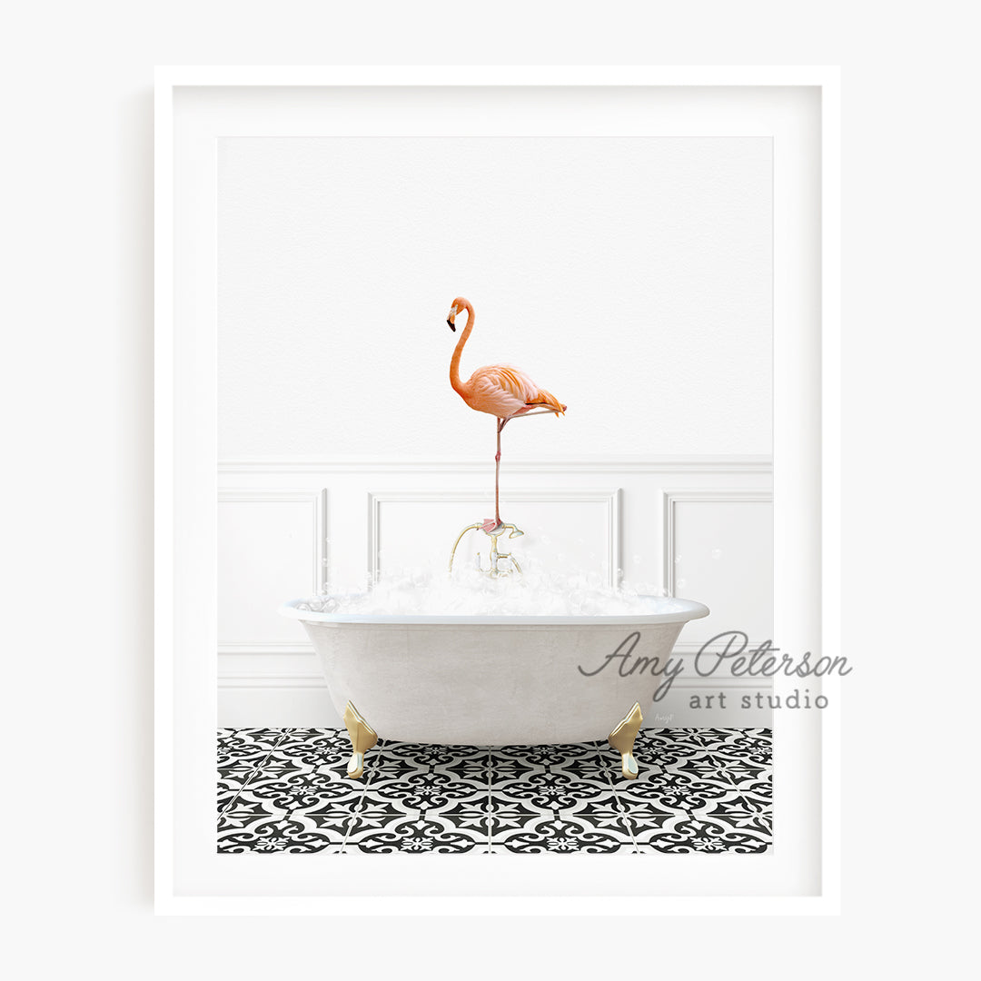 a pink flamingo standing on top of a bathtub