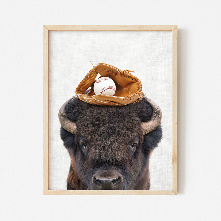 a picture of a bison with a baseball cap on its head