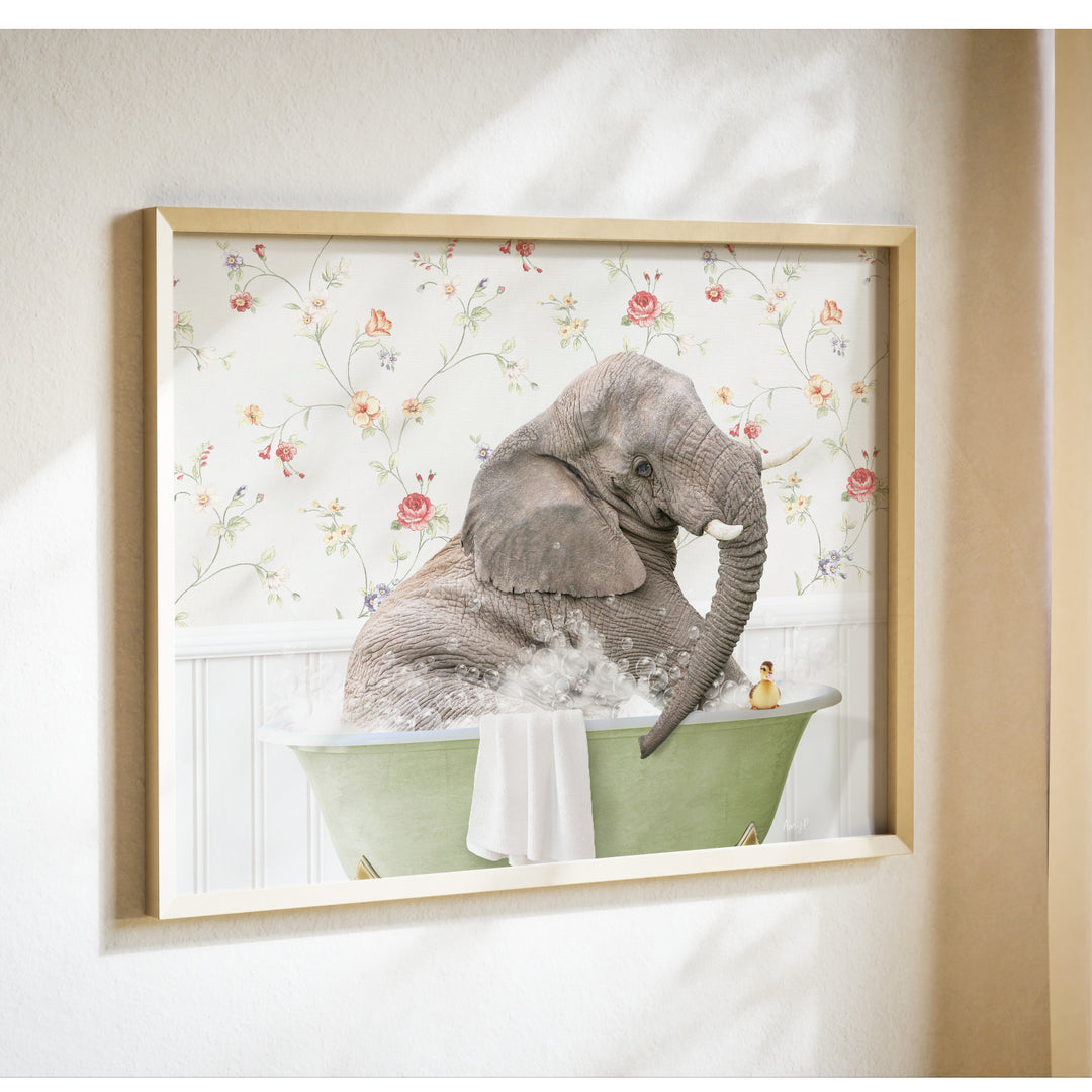 A gray elephant is sitting in a green bathtub, surrounded by a floral patterned wall.