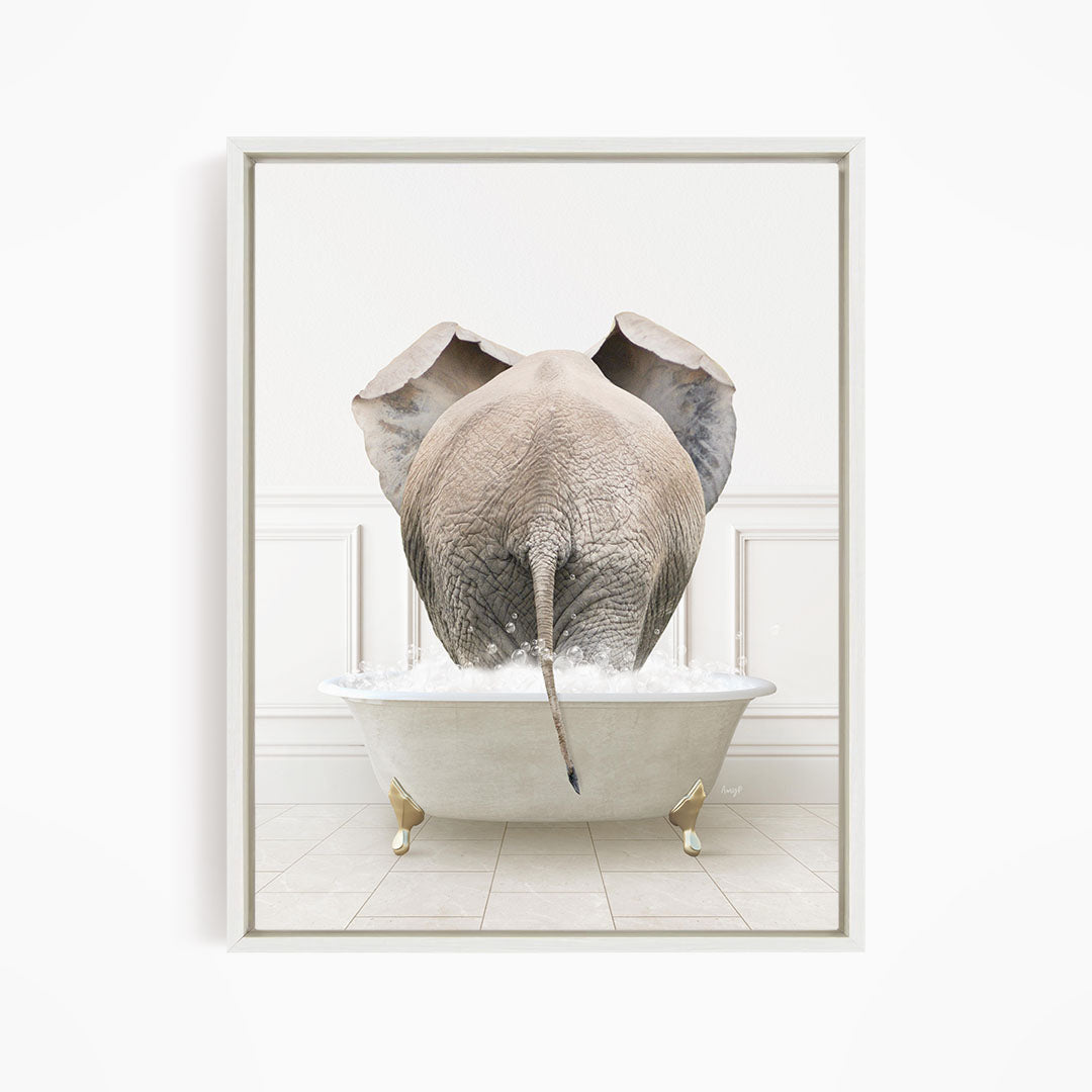 A large elephant is standing in a white bathtub filled with water, creating a whimsical and playful scene.