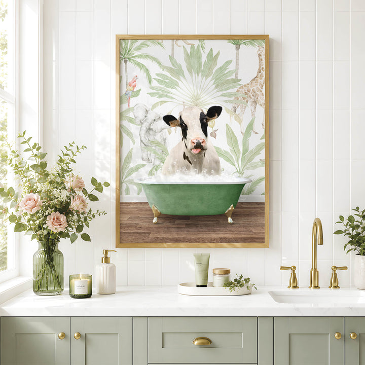 a bathroom scene with a framed picture of a cow sitting in a bathtub, surrounded by a tropical plant and flowers. The bathroom has a white countertop, a sink, and a mirror. There are also decorative elements such as a vase with flowers and candles on the countertop.