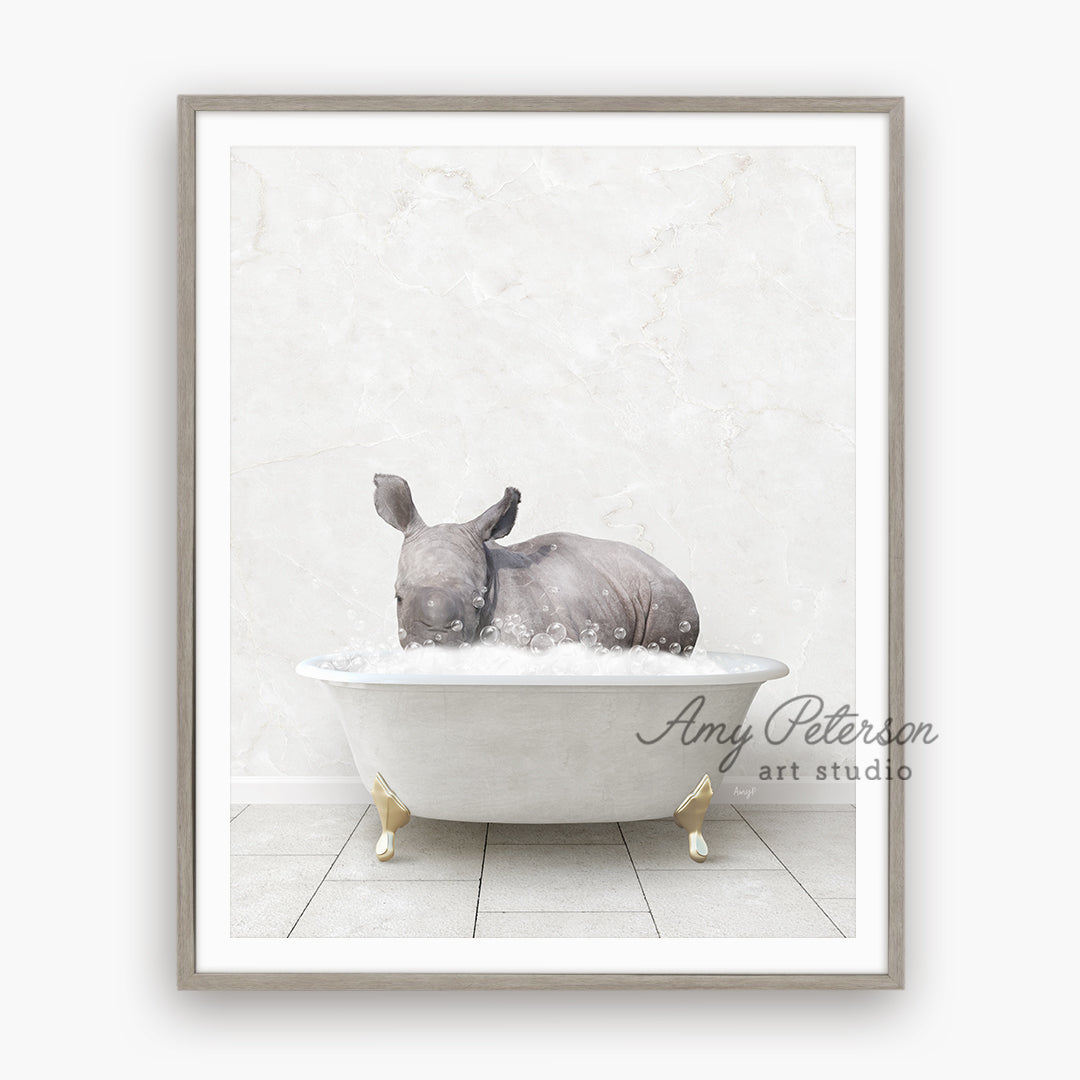 a rhino is taking a bath in a bathtub