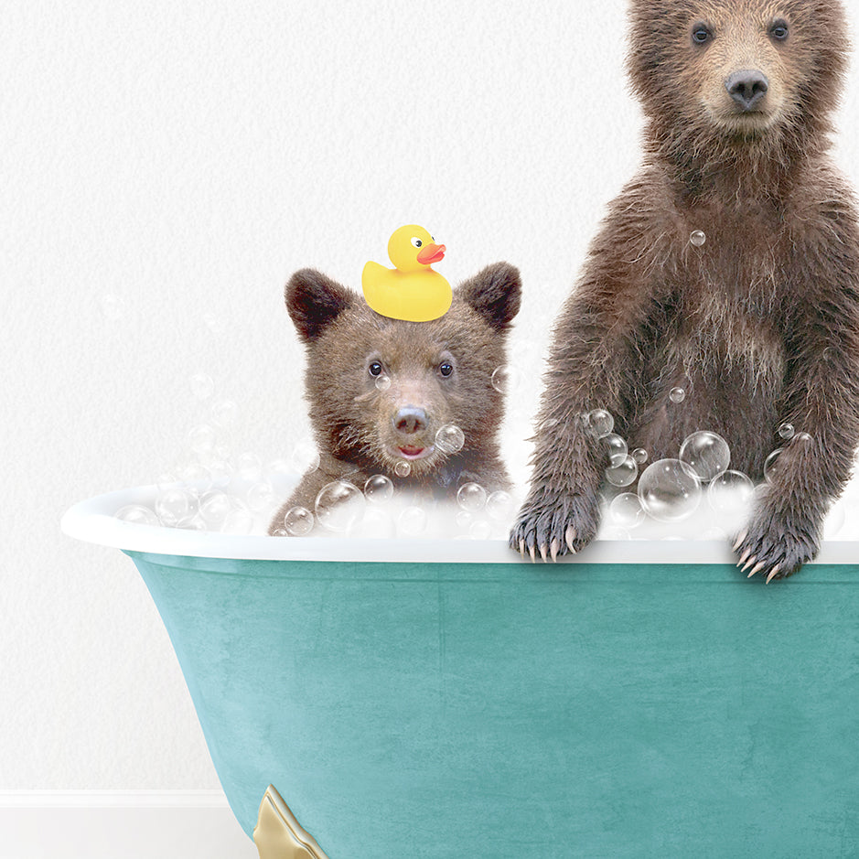 two brown bears in a bathtub with rubber ducky hats