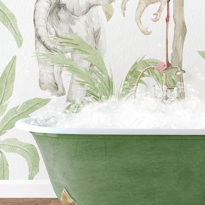 a green bathtub filled with foam and a painting of an elephant