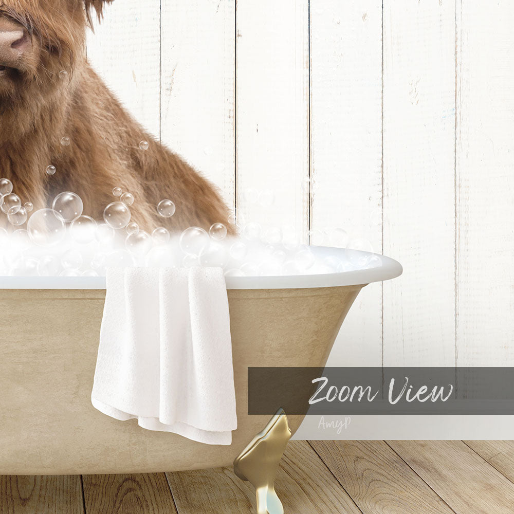 A dog is sitting in a bathtub filled with bubbles, with a towel hanging on the side.