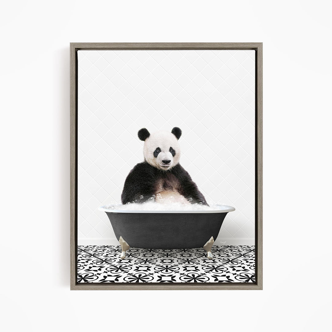 A panda bear sitting in a bathtub filled with bubbles, surrounded by a black and white patterned tile floor.